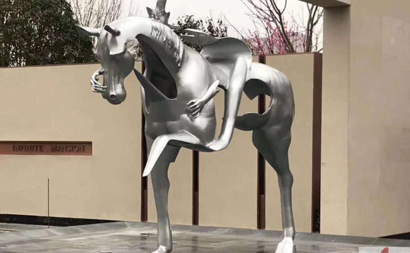 不锈钢抽象人骑马雕塑图片