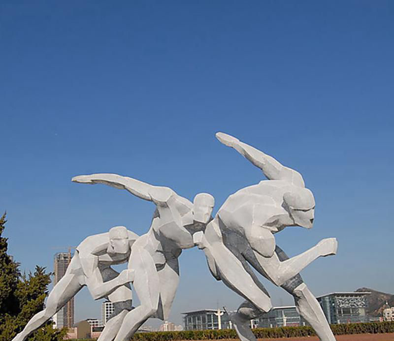 广场不锈钢滑冰人物雕塑图片