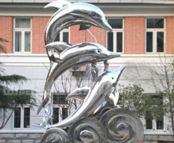 公园不锈钢跳跃的海豚海浪雕塑图片