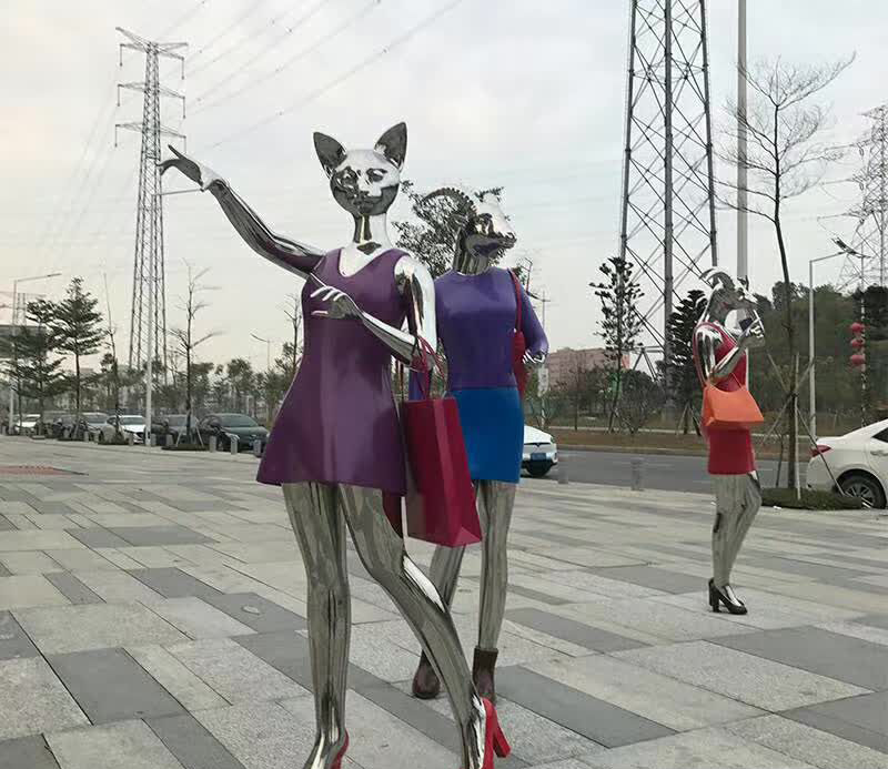 不锈钢逛街人物雕塑图片