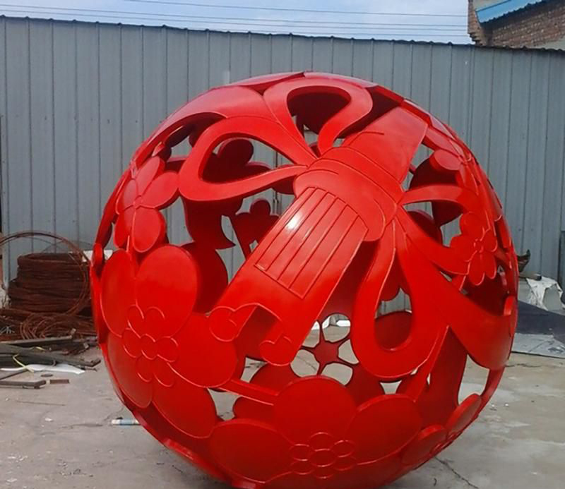 公园不锈钢红色镂空球雕塑图片