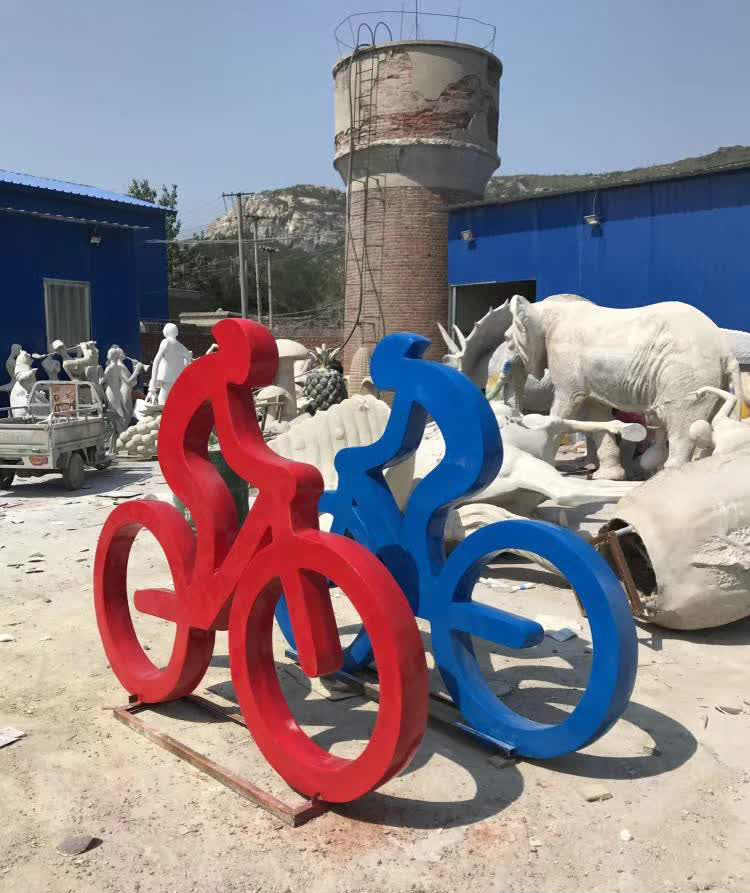 彩色不锈钢单车人物雕塑图片