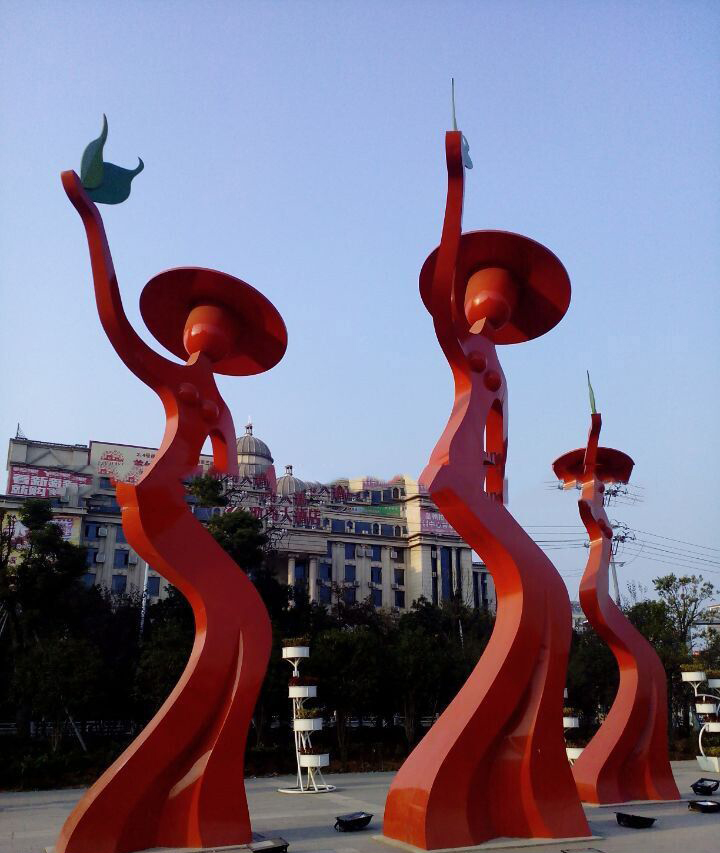 广场不锈钢跳舞的抽象人物雕塑图片