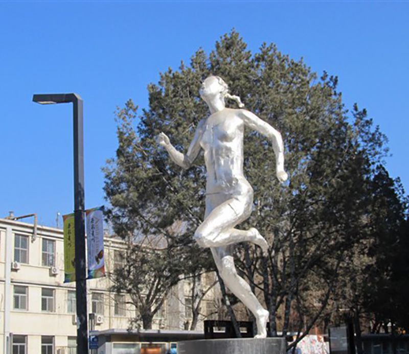 不锈钢跑步人物雕塑图片