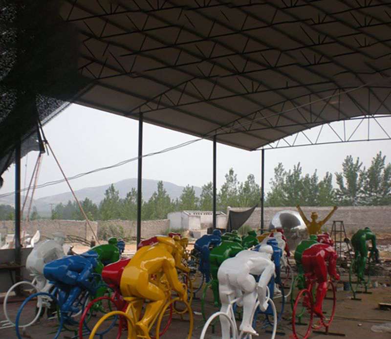 不锈钢骑自行车运动雕塑图片