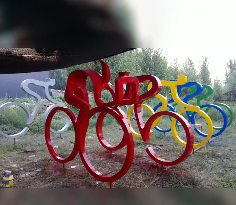 不锈钢骑自行车抽象人物雕塑图片