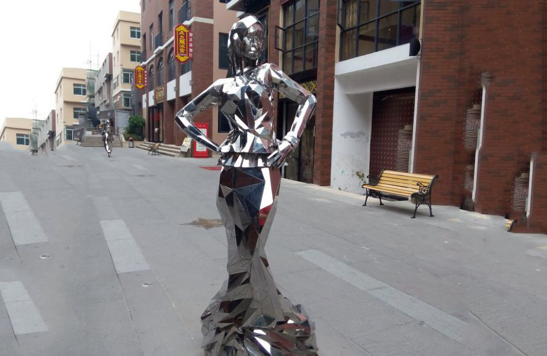 广场不锈钢抽象美女雕塑图片