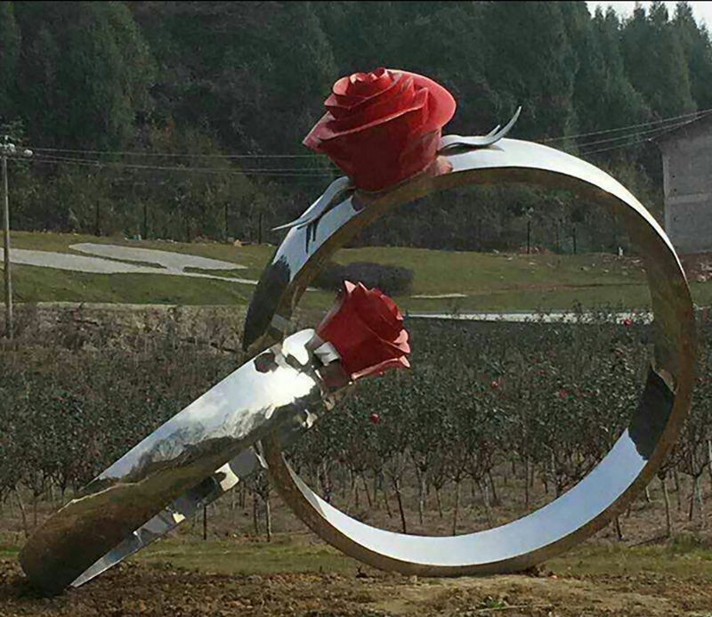不锈钢玫瑰花对戒雕塑图片