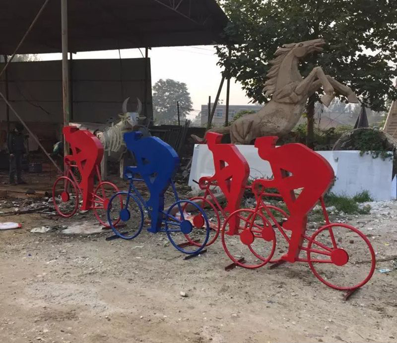 不锈钢骑自行车人物雕塑 图片