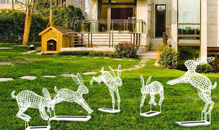 不锈钢兔子镂空摆件雕塑图片