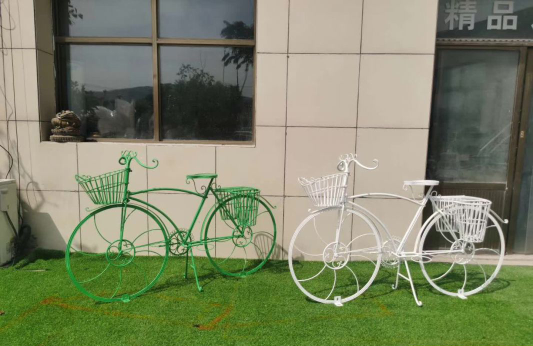 不锈钢镂空自行车雕塑图片