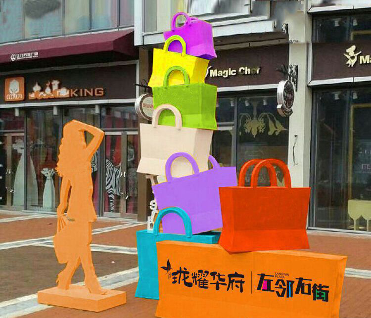 彩色不锈钢逛街购物人物雕塑图片