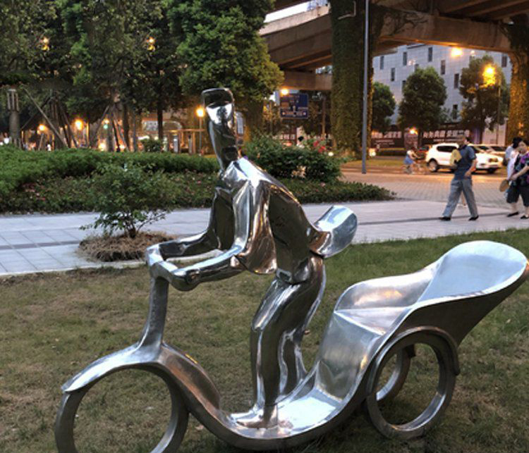 不锈钢抽象三轮车人物雕塑图片