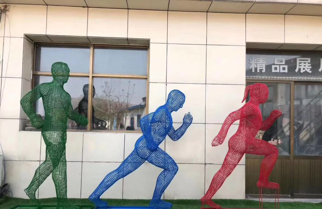 不锈钢运动奔跑人物雕塑图片