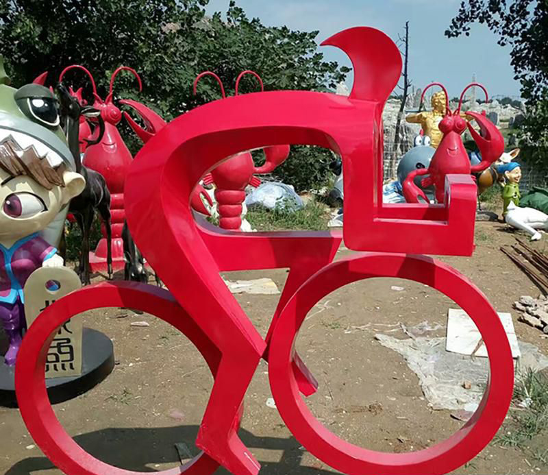 公园不锈钢单车运动雕塑图片
