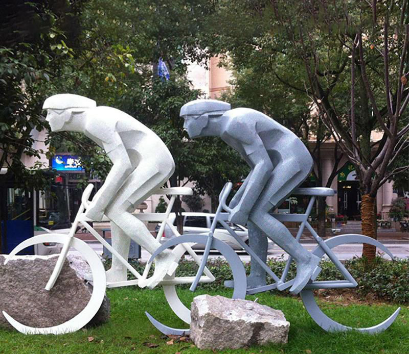 公园不锈钢骑自行车人物景观雕塑图片