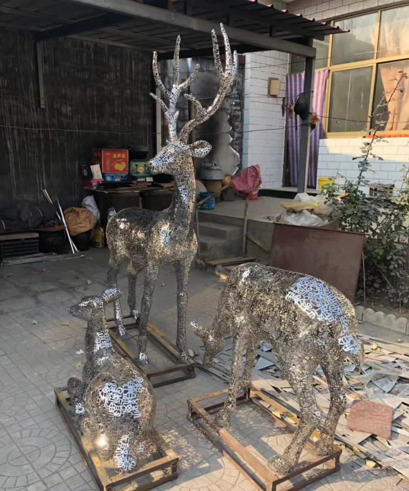 不锈钢庭院镂空动物梅花鹿雕塑图片