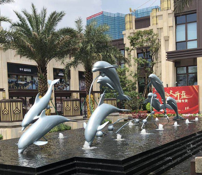 不锈钢小区海豚跳跃喷泉雕塑图片