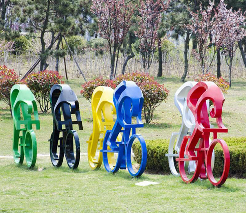 公园不锈钢骑车抽象人物雕塑图片