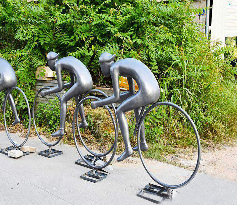 不锈钢抽象骑单车人物雕塑图片